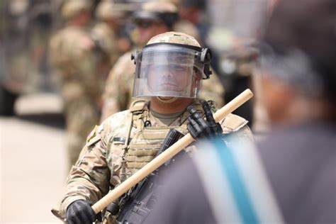 Thousands fill the streets, block freeway after Trump deploys National Guard