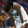 探讨NBA明星控卫贾·莫兰特肩部实验室撕裂伤的详细情况,分析其对孟菲斯灰熊队的影响及恢复进程,为球迷提供专业医疗视角和赛季影响评估。
