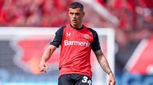 详尽解析格拉尼特·扎卡从勒沃库森转会到桑德兰的交易背景、影响及其对两队未来的深远意义,同时深度剖析勒沃库森在英格兰市场上的高额转会收入及战略布局。
