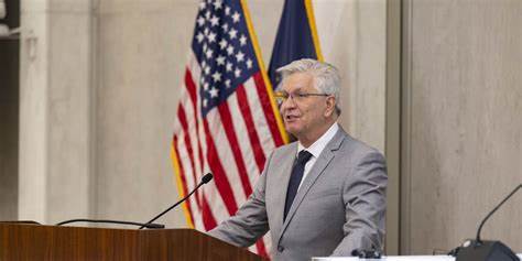Fed governor hopeful about rate cuts as markets reel